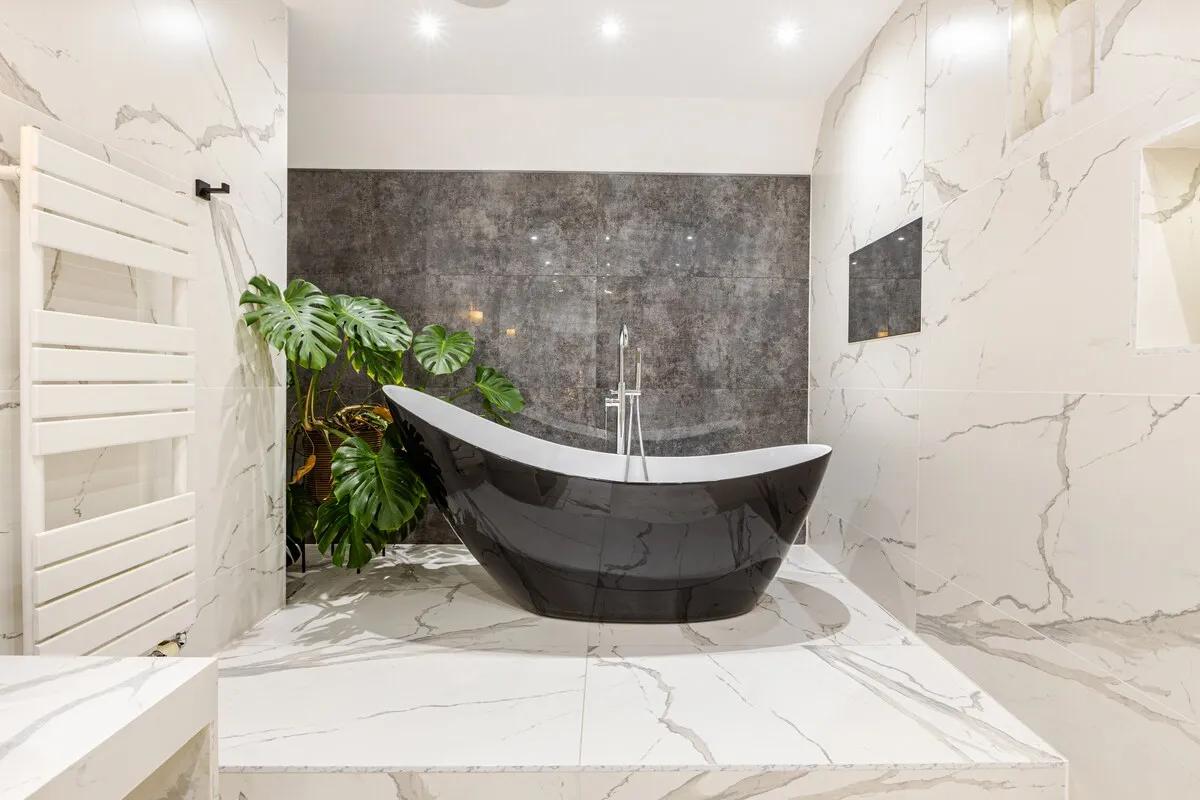 Principal suite en-suite — standalone bath with marble surround